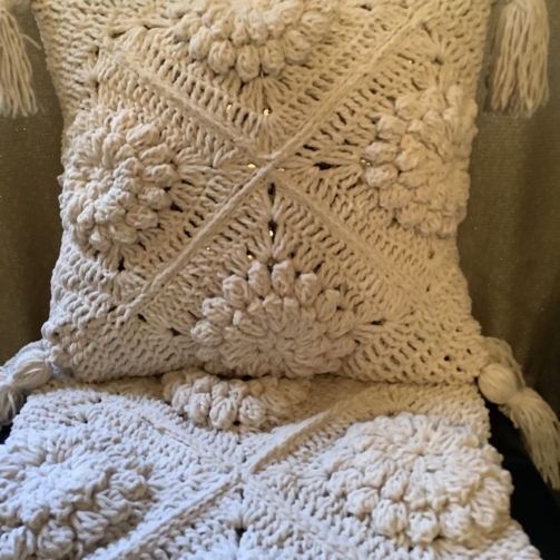 Cushion Covers category — colorful decorative cushions arranged on a sofa
